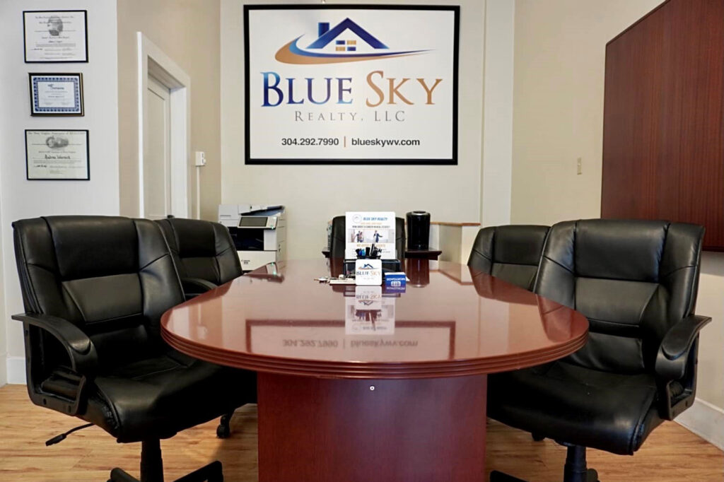 Blue Sky Realty conference room with large table and chairs